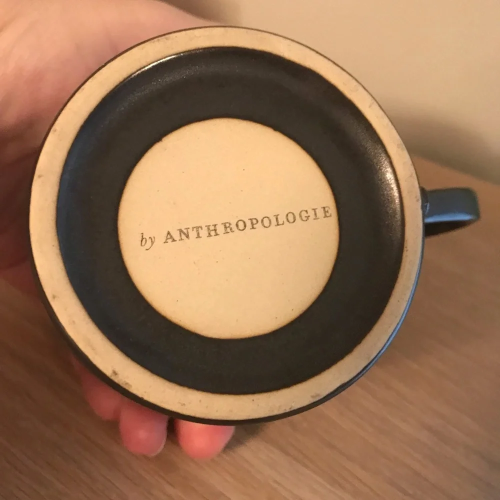 Black Anthropologie iridescent ceramic tea cup
